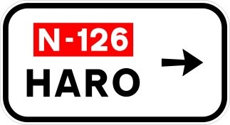 Señal S-348: Señalización de salida inmediata, con cartel lateral, en carretera convencional o carretera multicarril hacia carretera convencional o carretera multicarril